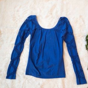 Bebe stretchy blue top with cut outs on arms